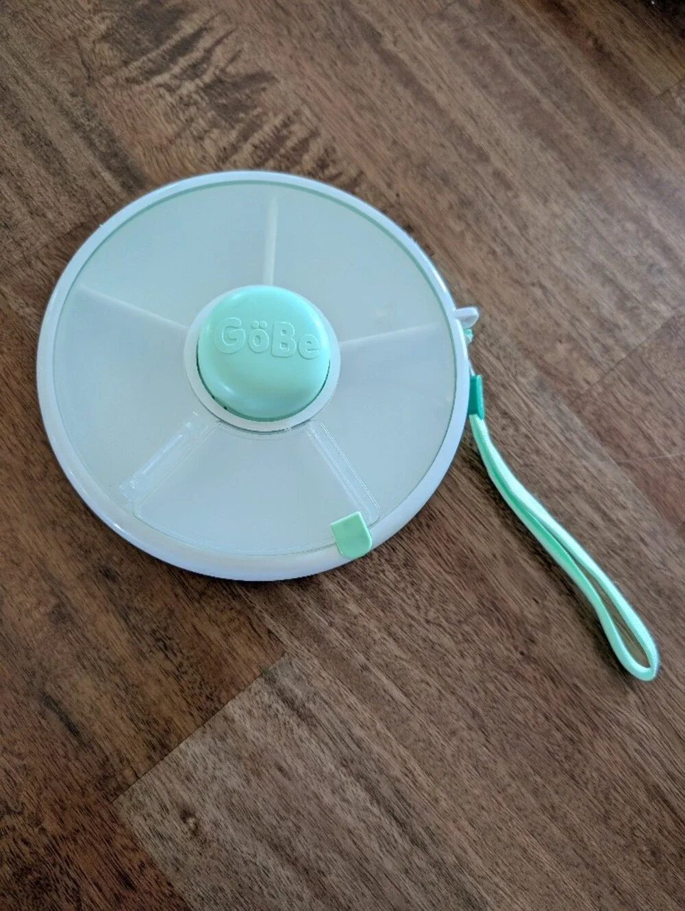 mint green GoBe Kids Snack Spinner